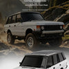 A white Land Rover Range Rover model is shown in a studio setting, ready for restoration or replication.