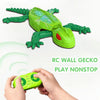 A green RC wall gecko toy is shown with a hand operating the remote control.