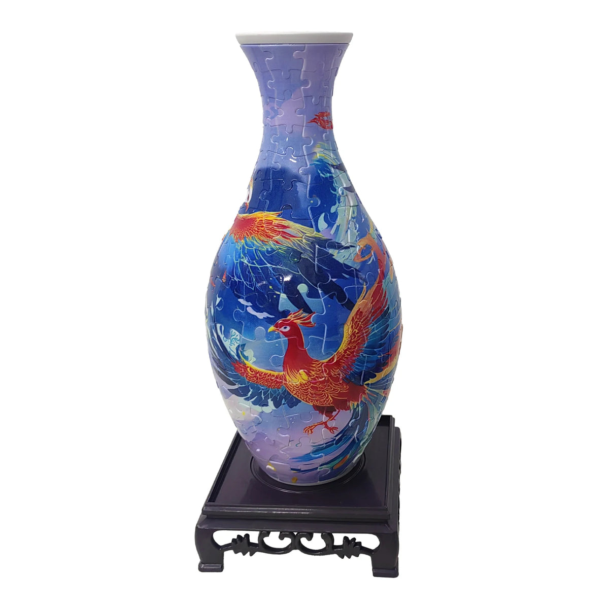 Blue and white porcelain flower vase with a dragon design, displayed on a dark stand.