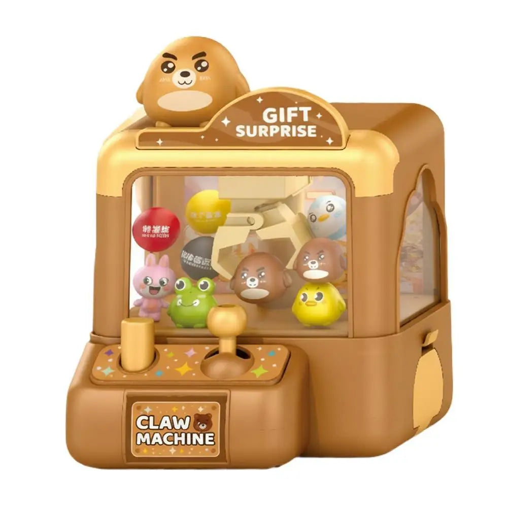 A brown mini claw machine toy for kids with a clear display box and a gift surprise sign.