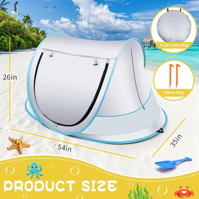 A white instant pop-up baby tent is shown outdoors on a beach with yellow pegs and sea life.