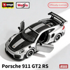 A diecast model of a Porsche 911 GT2 RS in silver and black, shown from the side.