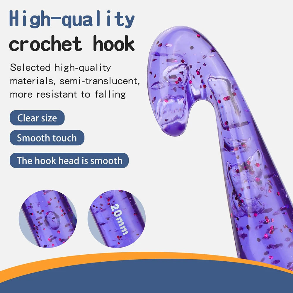 A close-up view of a clear purple crystal crochet hook, showing its smooth finish and size markings.