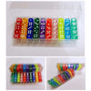 A collection of 100 acrylic six-sided dice in various colors and sizes displayed in a clear plastic box.