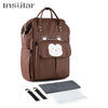 A brown Insular waterproof diaper backpack with a changing mat and stroller straps shown next to the accessories.