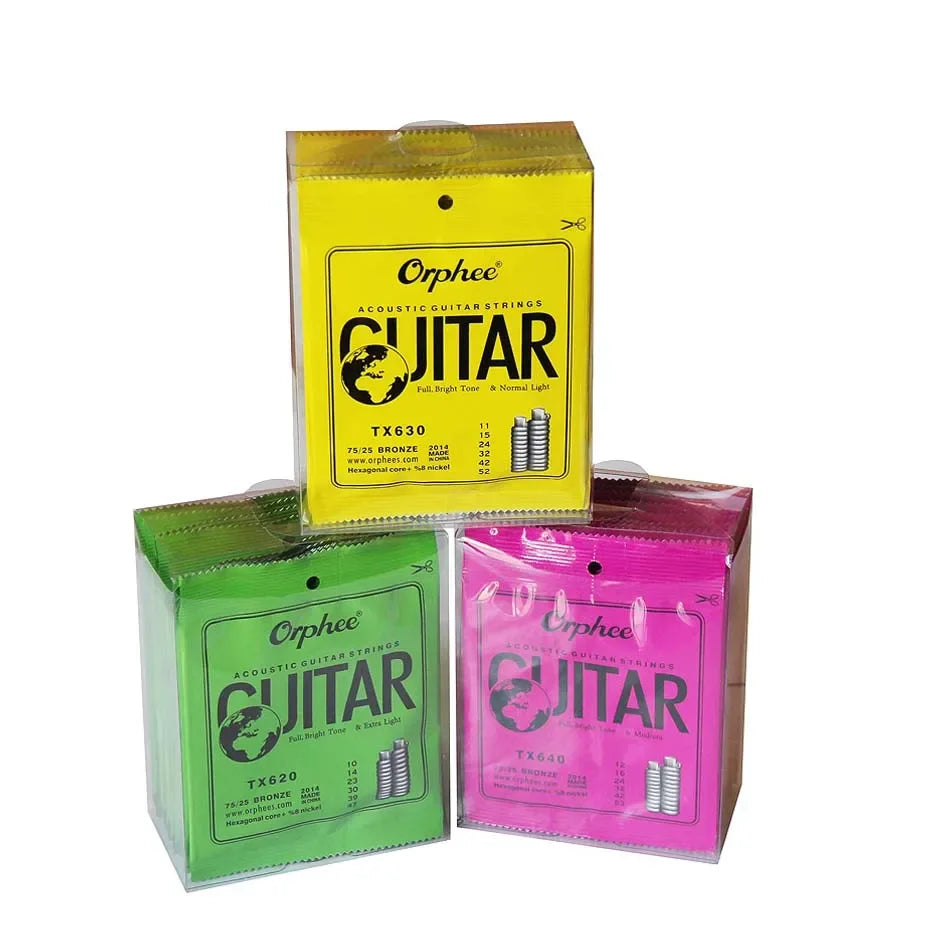 Three packages of Orphee Acoustic Guitar Strings set in yellow, green, and pink packaging