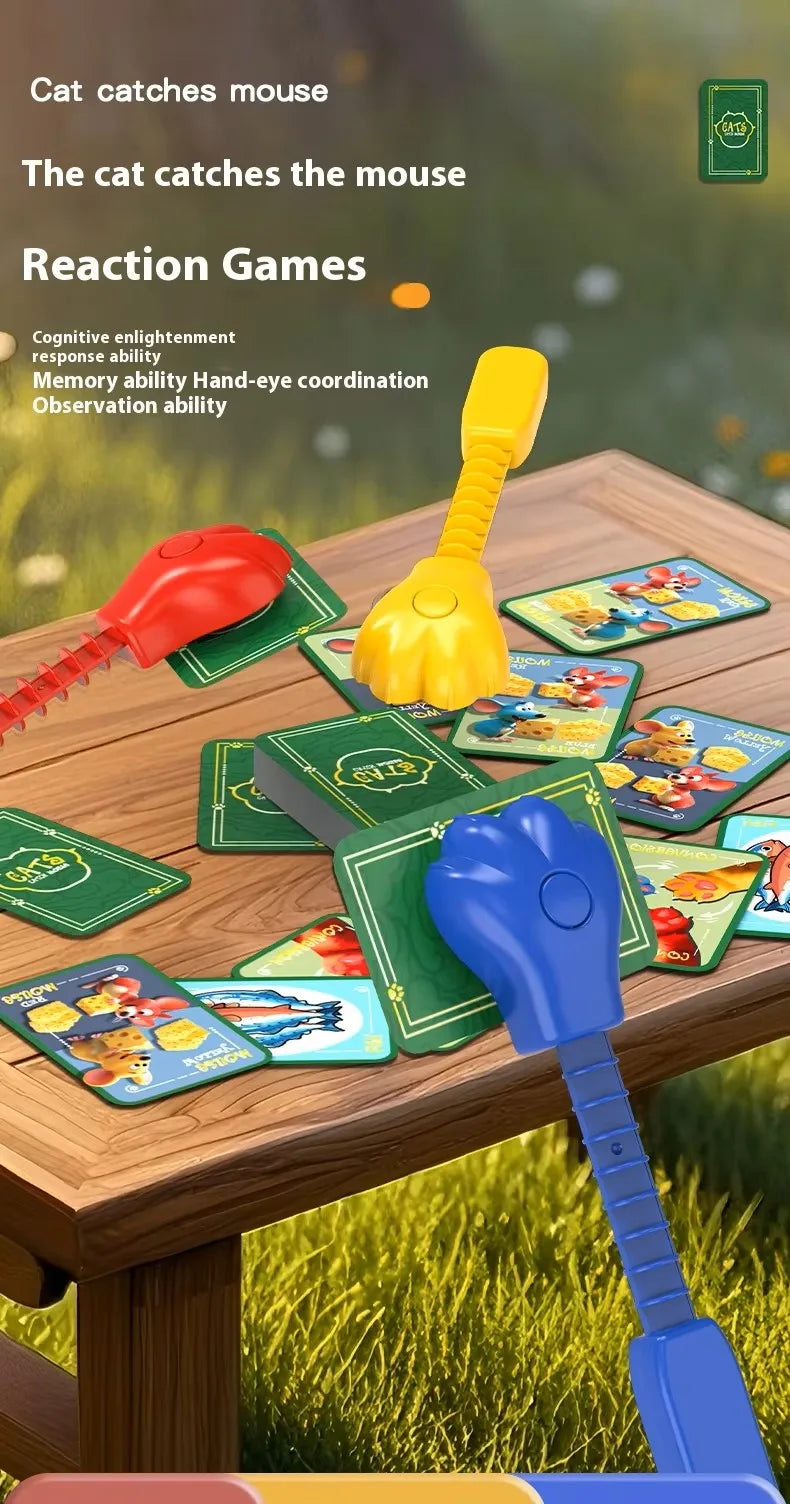 A set of reaction games featuring a cat and mouse theme with various colored plastic toys and cards on a wooden table.