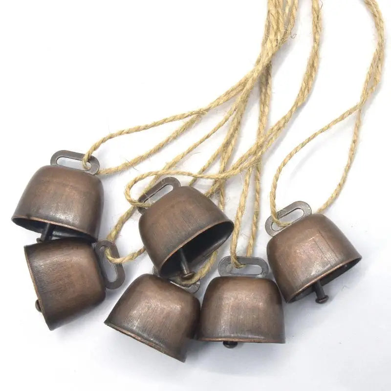 Rustic copper jingle bells with hemp rope for Christmas decor and pet collars