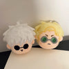 A pair of fluffy anime plush keychains featuring characters from Jujutsu Kaisen, one white-haired and one yellow-haired.