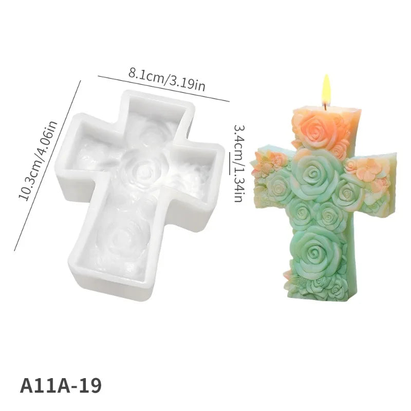 A floral cross silicone mold with a wax candle inside, featuring peach and green roses.