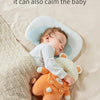 A baby is sleeping peacefully on a soft silicone head protection pillow shaped like a bear.