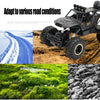 A black high-speed 4WD off-road RC truck is shown navigating various terrains including snow, dirt, and grass.