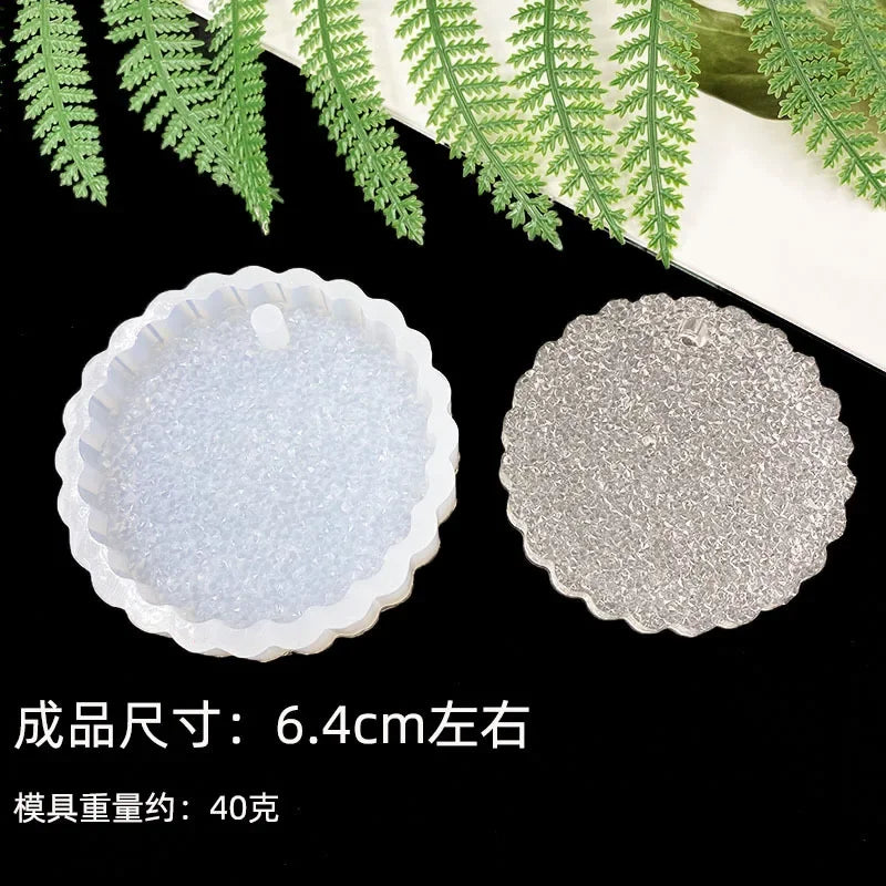 A set of flexible silicone resin molds in white and silver shades for DIY jewelry making