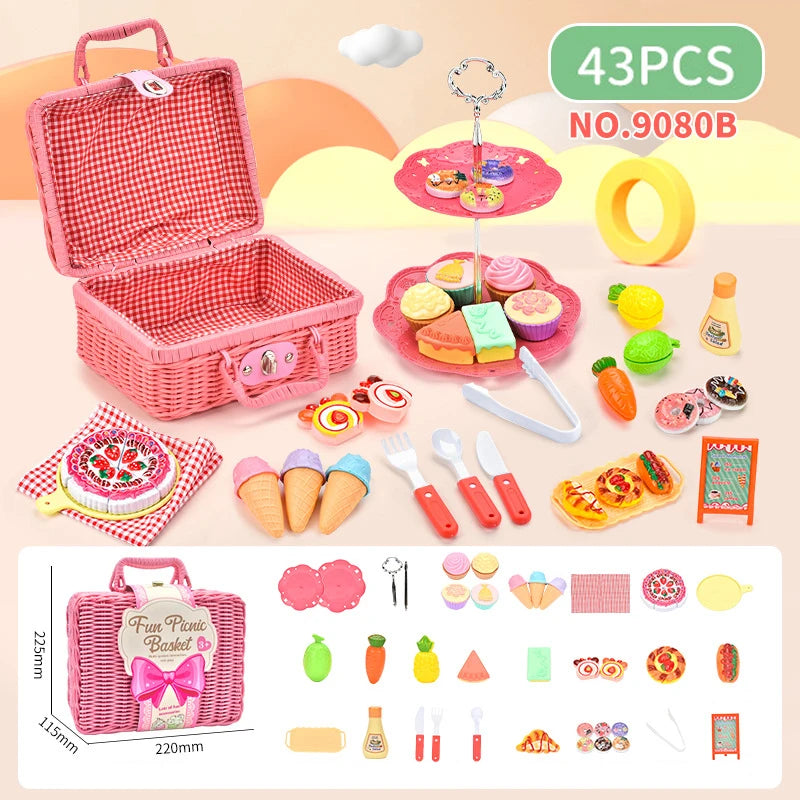 A pink wicker picnic basket set featuring 43 pieces of pretend play food and accessories for a tea party.