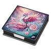 A leather box containing a diamond painting kit featuring a vibrant pink and purple mythical bird design.