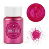A glass jar of rose red pearl powder and a circular swatch of the same color