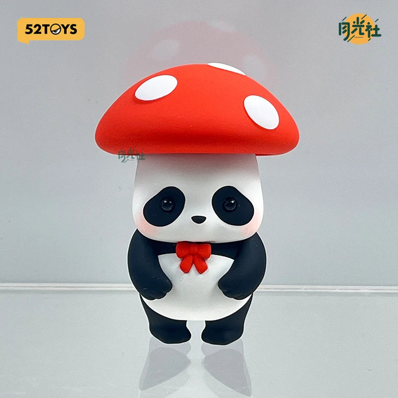 A collectible figure of a panda with a red mushroom cap, displayed against a light gray background.