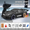 Black RC drift concept car and steering wheel with various accessories for racing