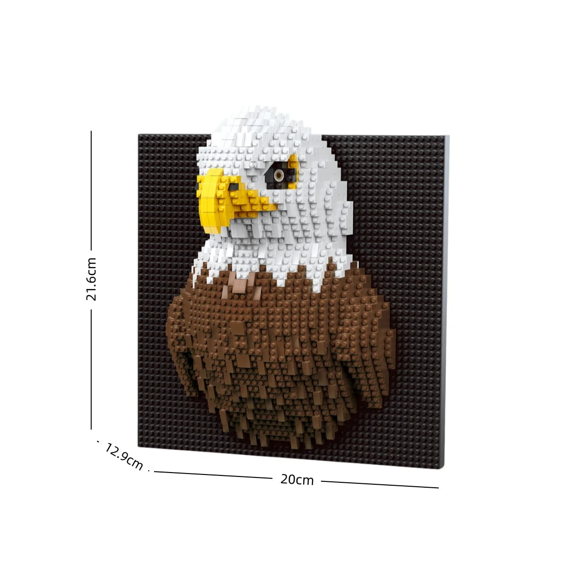 A model of an owl built from black and yellow LEGO-style building blocks.