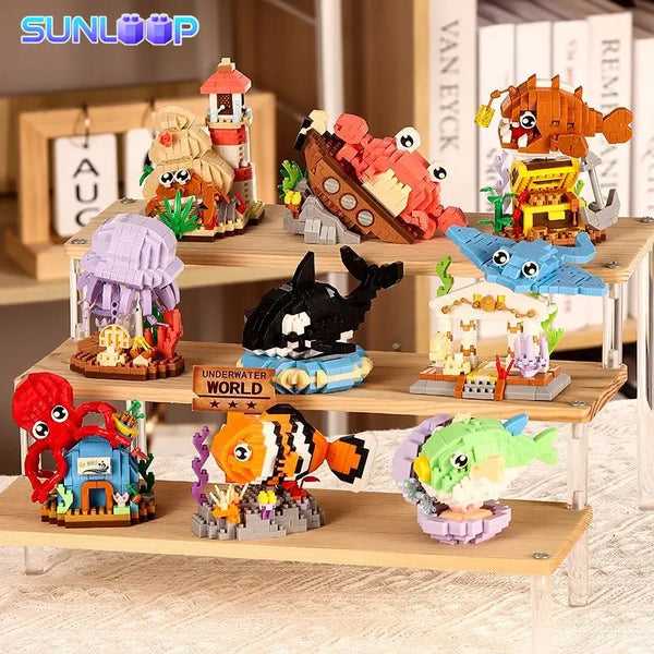 A set of ocean animal building blocks featuring a shark, crab, and clownfish toys.