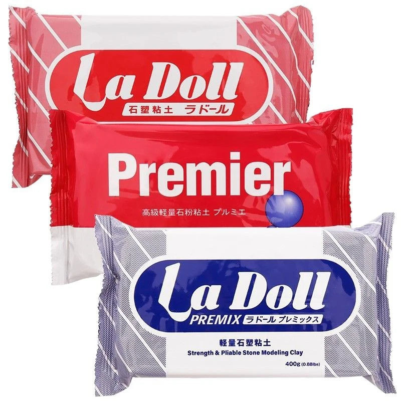 A package of La Doll Premier air-dry stone plastic clay for sculpting and crafting.