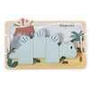 A wooden dinosaur toy set featuring a stegosaur silhouette and surrounding elements like a mountain and palm tree.
