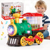 A green electric steam train toy truck with yellow lights and a red engine is shown next to its packaging.
