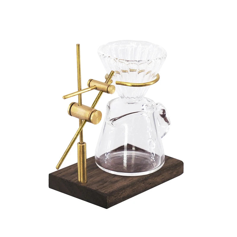 A miniature hand-brewed coffee stand set for dollhouse featuring a clear glass teapot and a brass stand.