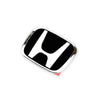 A black and silver emblem or badge featuring the stylized 'H' logo for Honda models.