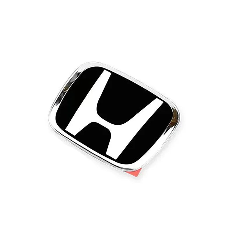 A black and silver emblem or badge featuring the stylized 'H' logo for Honda models.