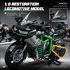 A detailed black and green model of a locomotive motorbike built from building blocks.