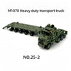 M1070 Heavy duty transport truck model in green camouflage.