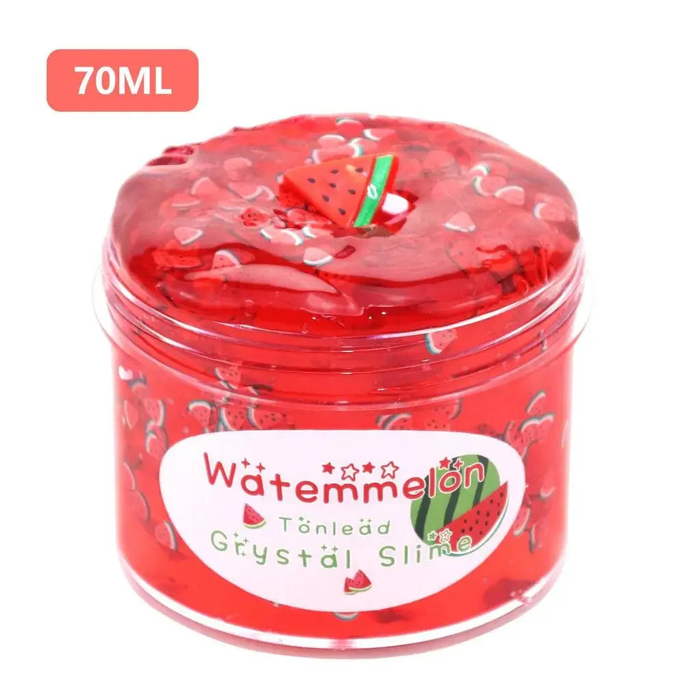 A jar of red watermelon slime putty with a slice of watermelon on top