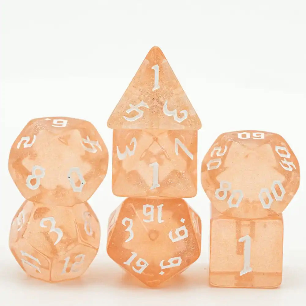 A set of seven translucent orange polyhedral dice, including a tetrahedron and a dodecahedron.