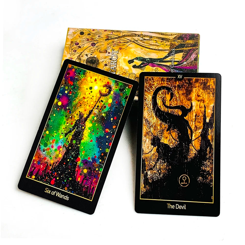 A set of illuminated tarot cards featuring the Six of Wands and The Devil cards.