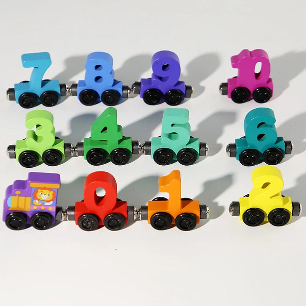 A set of colorful magnetic wooden train building blocks shaped like numbers 0 through 7.