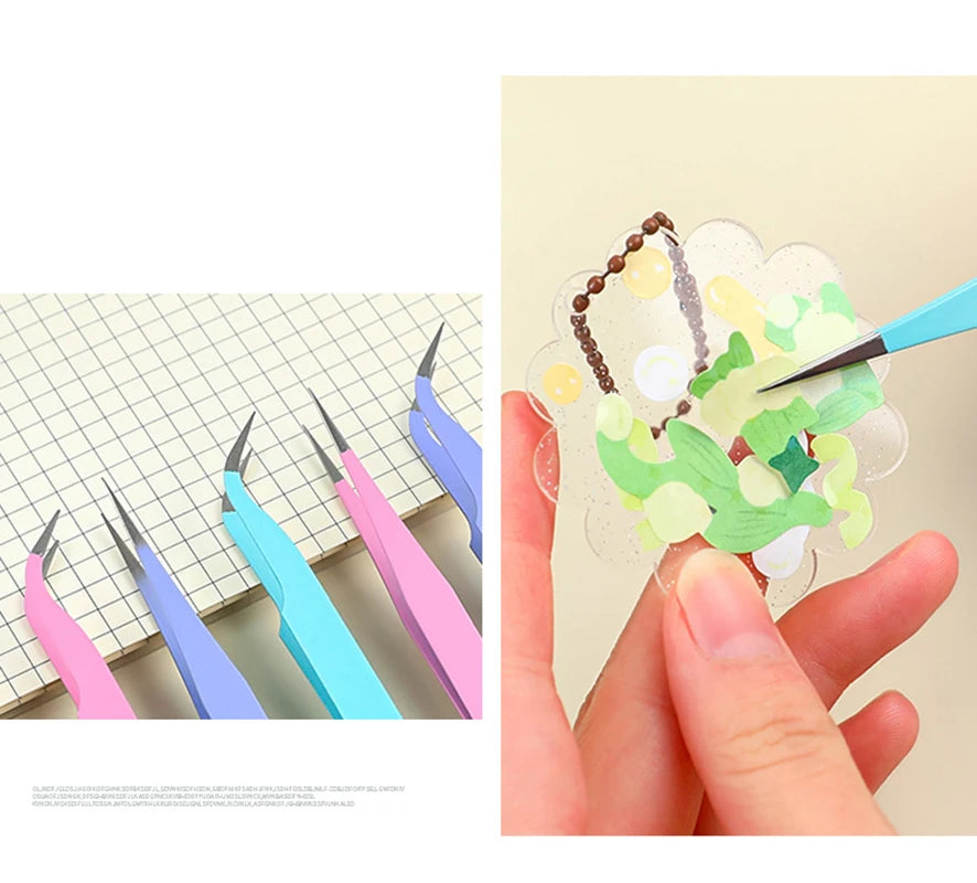 A hand uses precision stainless steel tweezers to place small decorative elements onto a translucent surface.