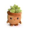 A small, round brown plush toy shaped like a pot holding green succulent leaves.