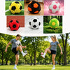 A set of twelve handmade crochet hacky sack balls in various colors including yellow, black, pink, and green.