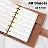 A brown leather organizer holding 40 sheets of habit tracker refill pages for A6, A7, and M5 planners.