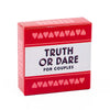 A red box for a Truth or Dare card game for couples with pink hearts and the title Truth or Dare for Couples