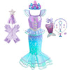 A purple and teal mermaid fantasy dress with a crown, ruffled fishtail skirt, and purple accessories.