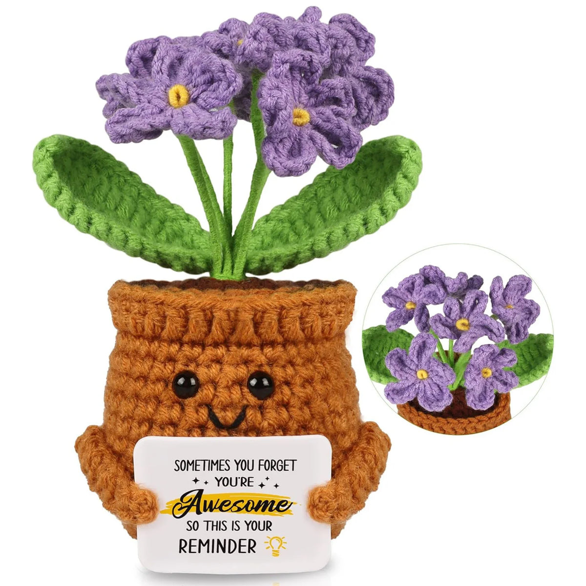Handmade crochet flower plant decoration with purple flowers in a brown pot