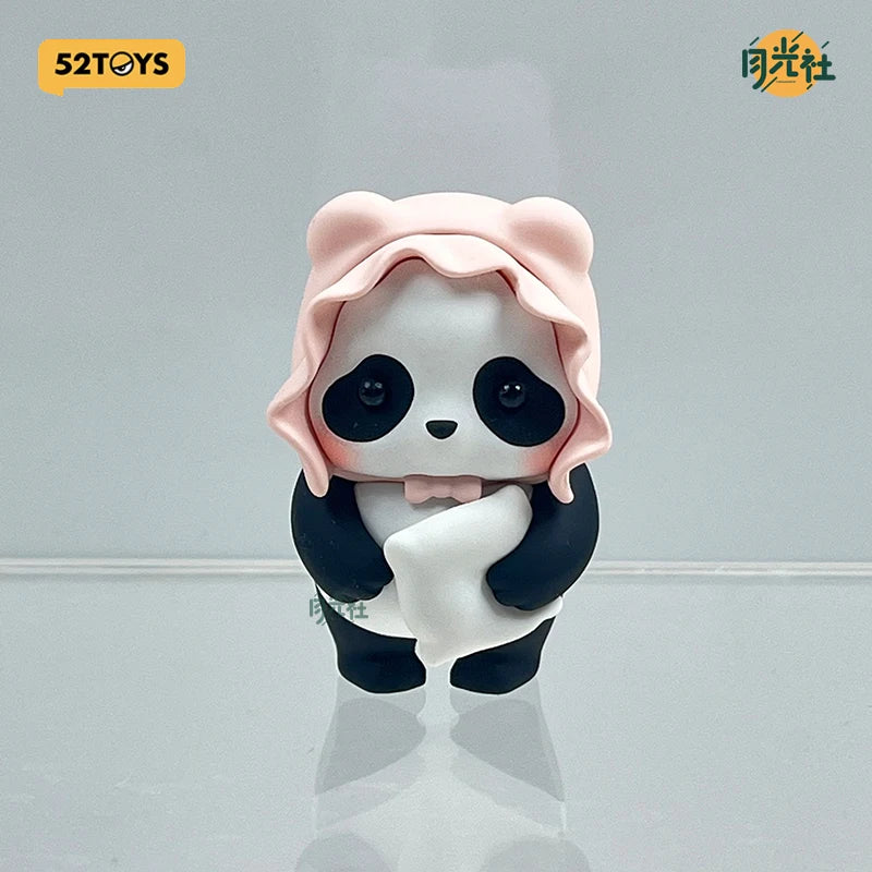 A cute collectible figure of a panda with pink hair and black and white fur, displayed against a light gray background.