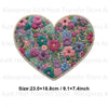 A heart-shaped floral letter bow iron-on patch featuring pink, purple, and green flowers for DIY clothing.