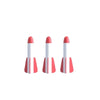 Three red and white air-powered stomp rocket launchers for outdoor play