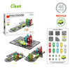 A box of MAG-PARADISE magnetic building tiles featuring road and rail elements with electric cars.