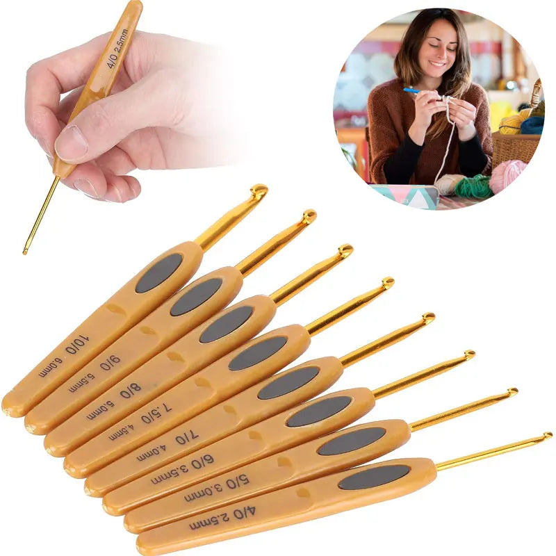 An assortment of eight wooden and gold-tipped crochet hooks in various sizes for crafting