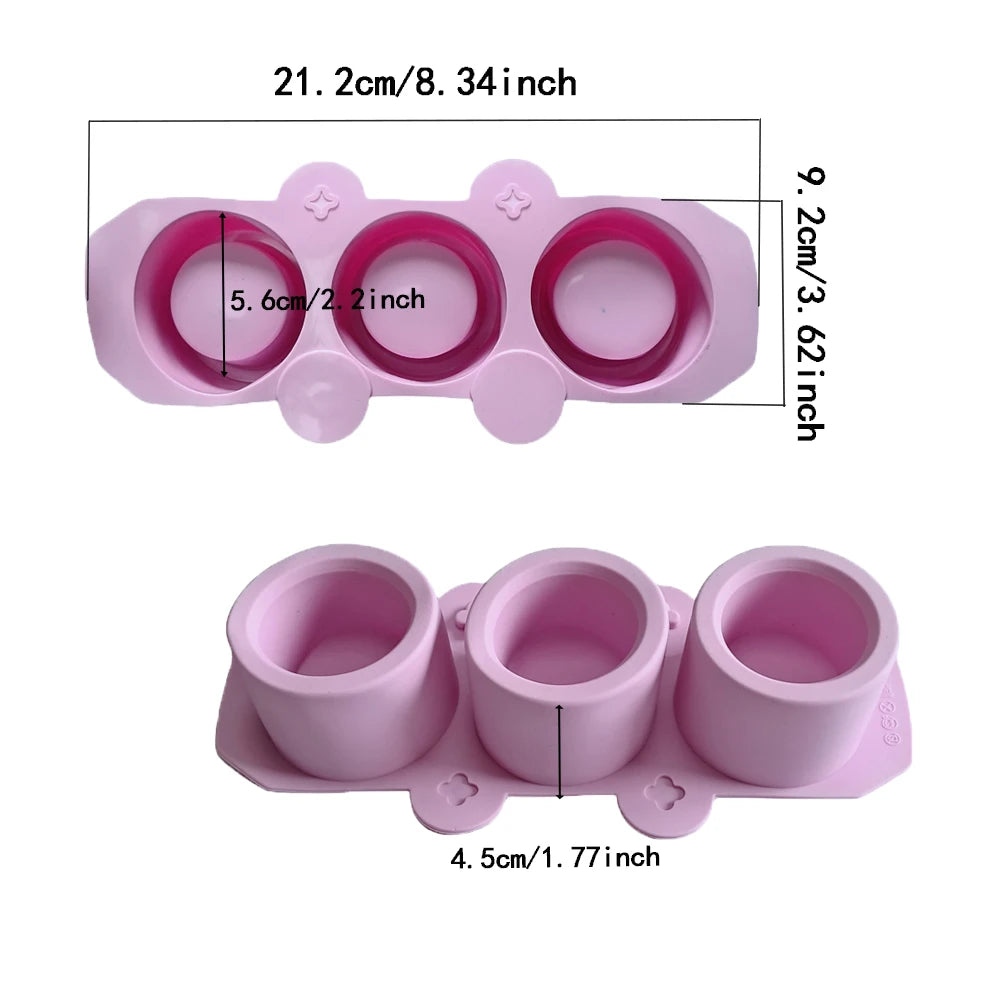 Pink flexible silicone mold with multiple sized plant pots and a separate small pot.