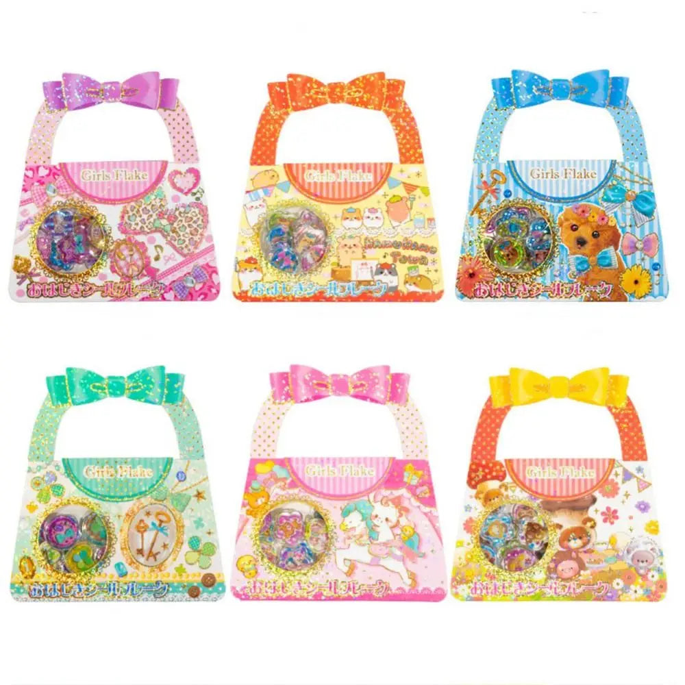 A set of nine heart-shaped clear plastic pouches filled with colorful Y2K crystal stickers featuring various glitter and lase